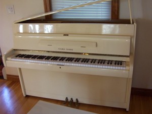 Young Chang white piano